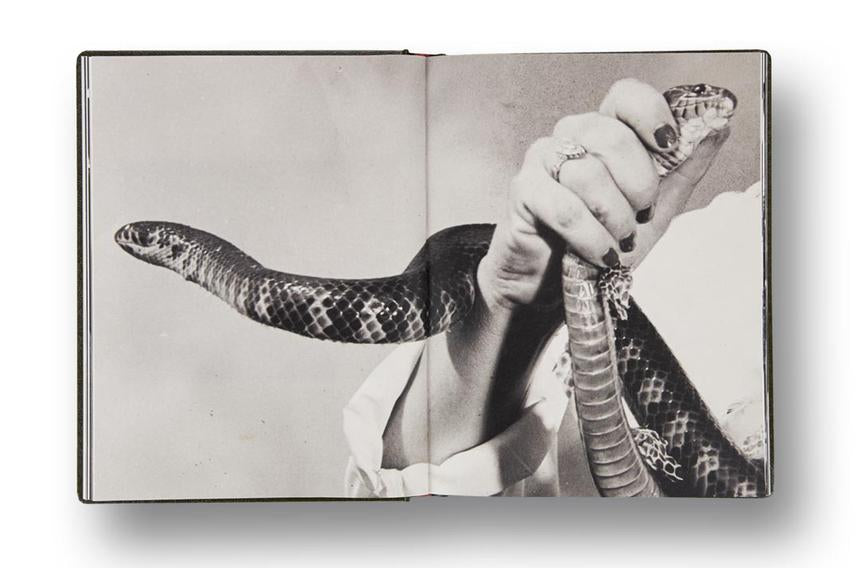Girl Plays with Snake | Clare Strand